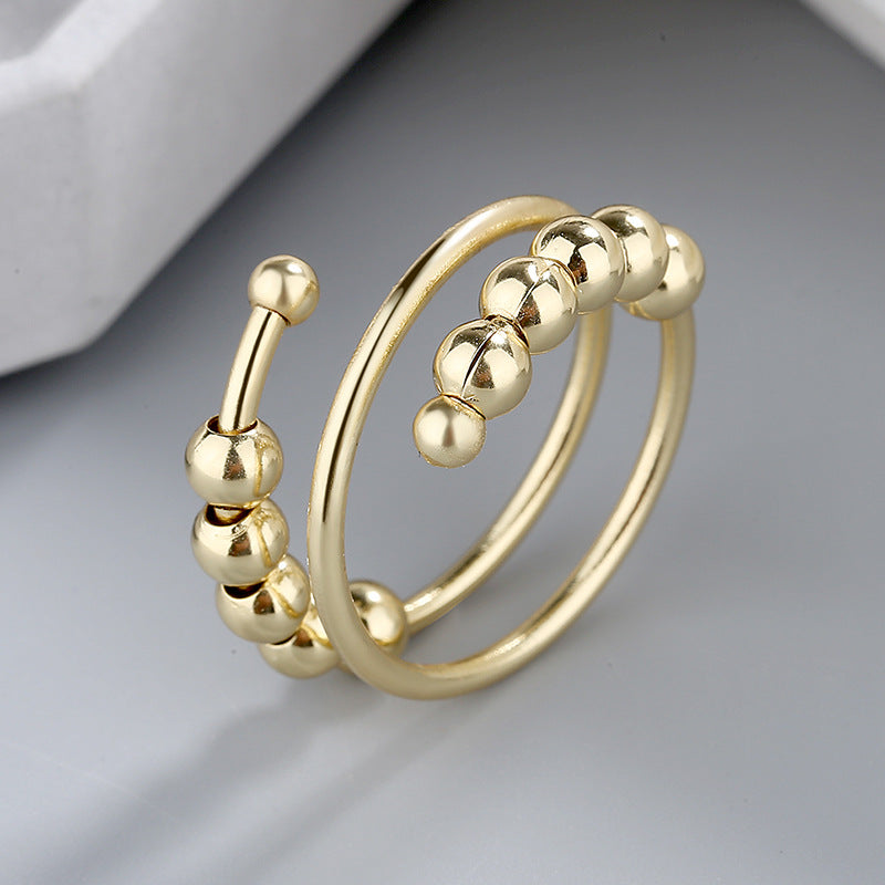 Meliora | Women's adjustable fidget ring with beads | Gold