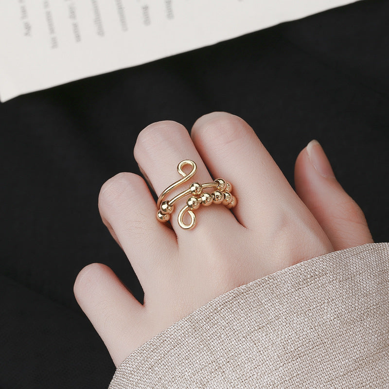 Meliora | Women's adjustable fidget ring with beads | Gold