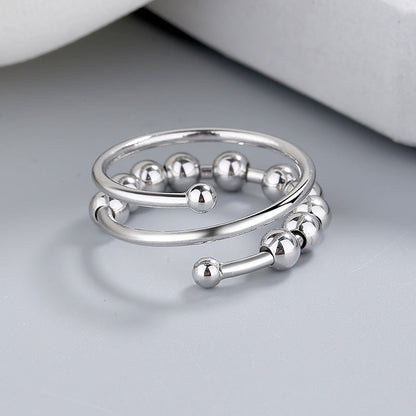 Meliora | Women's adjustable fidget ring with beads | Gold
